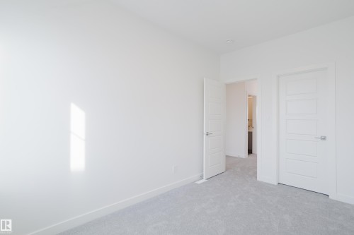 134 Mitchell Bend, Leduc, AB - Indoor Photo Showing Other Room