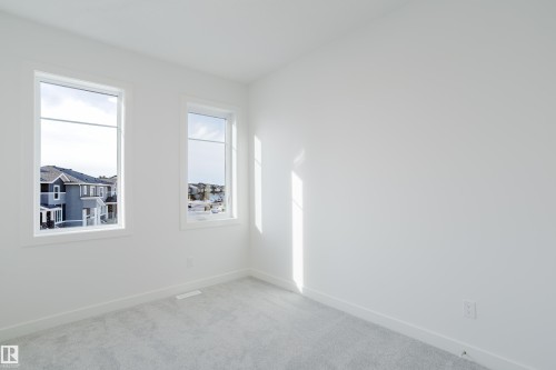 134 Mitchell Bend, Leduc, AB - Indoor Photo Showing Other Room