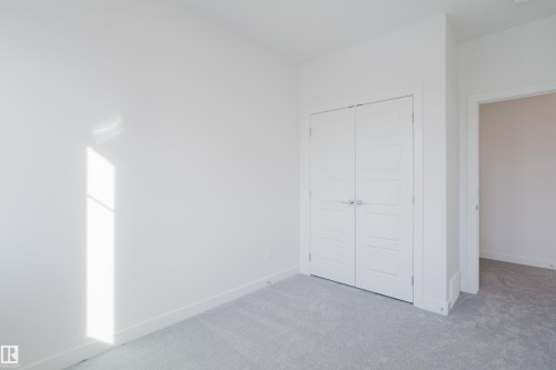 134 Mitchell Bend, Leduc, AB - Indoor Photo Showing Other Room