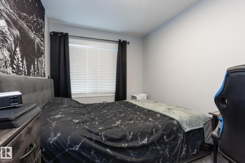 View of bedroom - 56 320 Secord Boulevard, Edmonton, AB - Indoor Photo Showing Bedroom