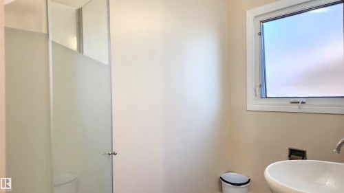 Bathroom featuring healthy amount of natural light - 4709 106 Street, Edmonton, AB - Indoor Photo Showing Bathroom