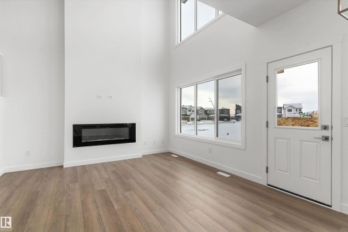 18927 28 Avenue, Edmonton, AB - Indoor Photo Showing Living Room With Fireplace