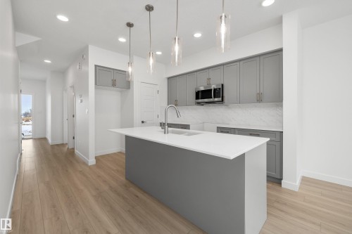 4592 Warbler Loop, Edmonton, AB - Indoor Photo Showing Kitchen With Upgraded Kitchen