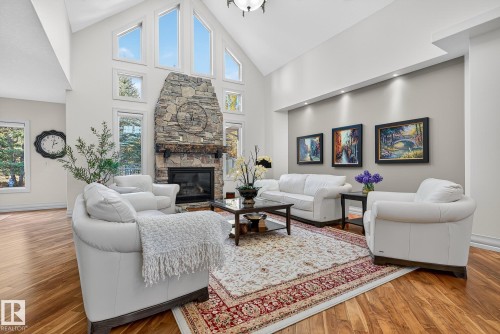 54 53305 Rge Road 273, Rural Parkland County, AB - Indoor Photo Showing Living Room With Fireplace