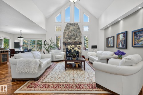 54 53305 Rge Road 273, Rural Parkland County, AB - Indoor Photo Showing Living Room With Fireplace