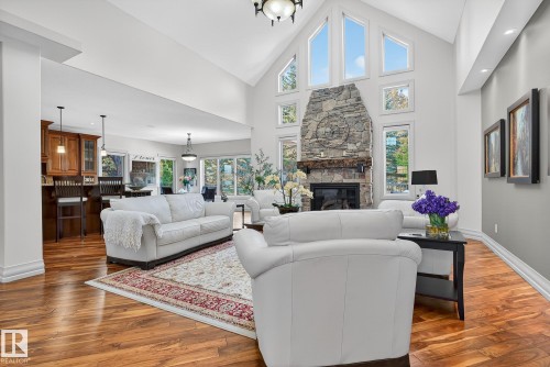 54 53305 Rge Road 273, Rural Parkland County, AB - Indoor Photo Showing Living Room With Fireplace