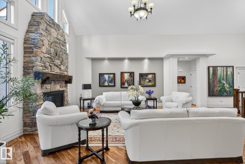 54 53305 Rge Road 273, Rural Parkland County, AB - Indoor Photo Showing Living Room With Fireplace