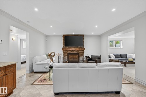 54 53305 Rge Road 273, Rural Parkland County, AB - Indoor Photo Showing Living Room With Fireplace