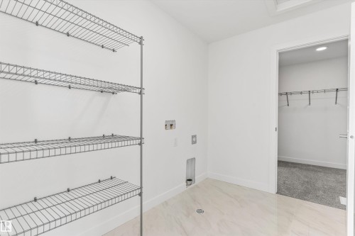 142 South Ravines Drive, Devon, AB - Indoor With Storage