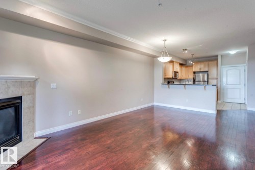 212 12408 15 Avenue, Edmonton, AB - Indoor With Fireplace