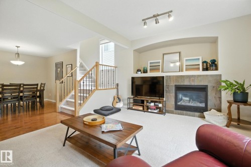 2084 Haddow Drive, Edmonton, AB - Indoor Photo Showing Living Room With Fireplace