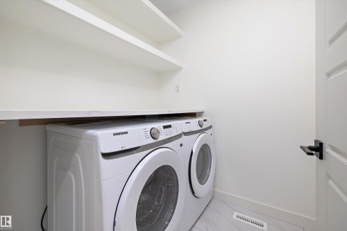 90 Chelles Wynd, St. Albert, AB - Indoor Photo Showing Laundry Room
