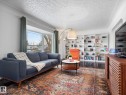 6408 84 Street, Edmonton, AB  - Indoor Photo Showing Living Room 