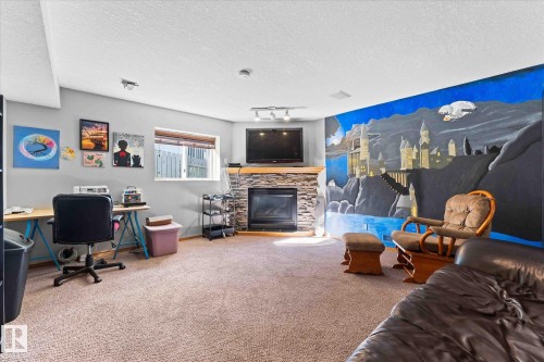 135 St. Andrews Drive, Stony Plain, AB - Indoor With Fireplace