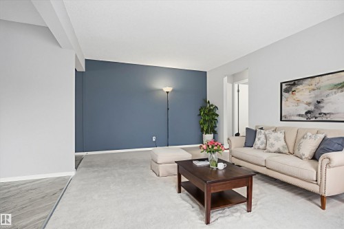 308 5730 Riverbend Road, Edmonton, AB - Indoor Photo Showing Living Room