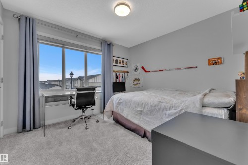 Bedroom featuring an office area and carpet - 906 Berg Place, Leduc, AB - Indoor Photo Showing Bedroom