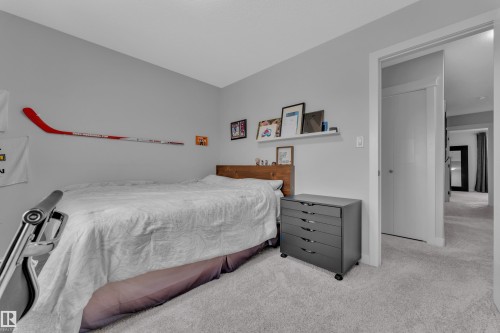 Bedroom featuring carpet flooring - 906 Berg Place, Leduc, AB - Indoor Photo Showing Bedroom