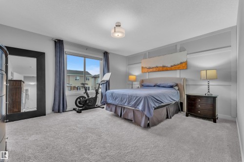 Bedroom with carpet floors - 906 Berg Place, Leduc, AB - Indoor Photo Showing Bedroom
