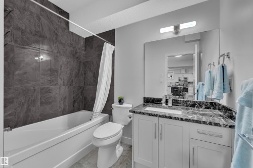 Full bathroom featuring shower / tub combo with curtain and vanity - 906 Berg Place, Leduc, AB - Indoor Photo Showing Bathroom