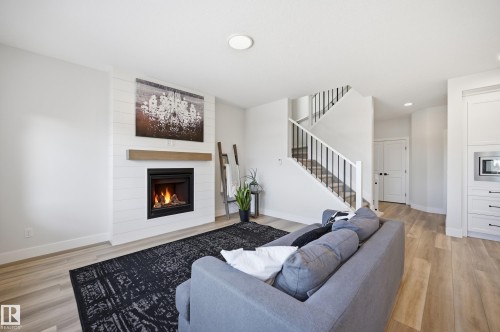 54 Willow Link, Fort Saskatchewan, AB - Indoor Photo Showing Living Room With Fireplace