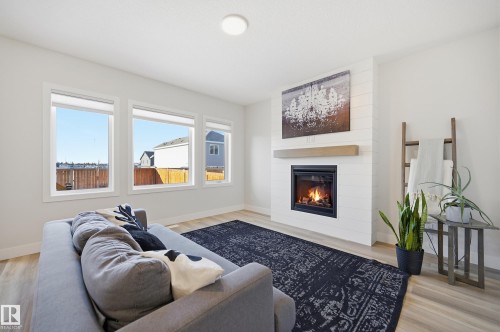54 Willow Link, Fort Saskatchewan, AB - Indoor Photo Showing Living Room With Fireplace