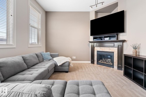 2 Longview Point(E), Spruce Grove, AB - Indoor Photo Showing Living Room With Fireplace