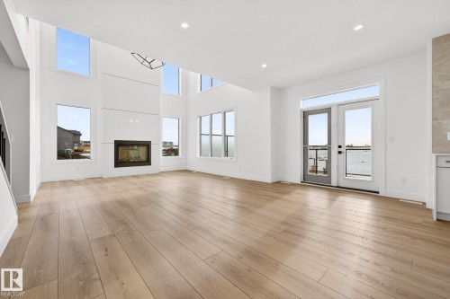 4005 40 Ave, Beaumont, AB - Indoor Photo Showing Living Room With Fireplace
