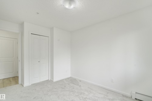 114 3357 16A Avenue, Edmonton, AB - Indoor Photo Showing Other Room