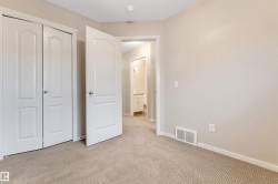 Unfurnished bedroom featuring a closet and carpet floors - 