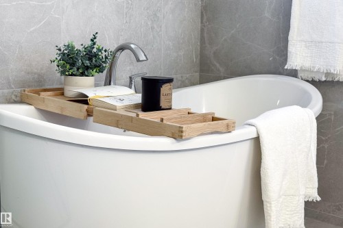 Bathroom view of a freestanding bath and tile walls - 34 Sun Meadows Cl, Stony Plain, AB - Indoor Photo Showing Bathroom