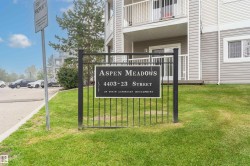 Community / neighborhood sign with a yard - 