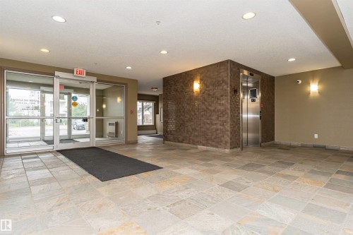 Common area with recessed lighting, a textured ceiling, and heating unit - 314 4403 23 Street, Edmonton, AB - Indoor Photo Showing Other Room