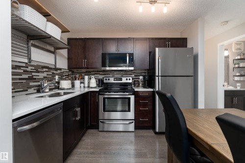 8 7385 Edgemont Way, Edmonton, AB - Indoor Photo Showing Kitchen With Double Sink