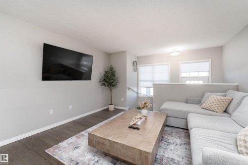 8 7385 Edgemont Way, Edmonton, AB - Indoor Photo Showing Living Room