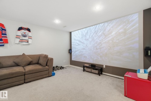 Home theater with carpet and recessed lighting - 64 2004 Grantham Court, Edmonton, AB - Indoor