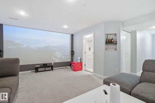 Carpeted cinema with baseboards and recessed lighting - 64 2004 Grantham Court, Edmonton, AB - Indoor