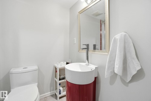 Bathroom featuring vanity and toilet - 64 2004 Grantham Court, Edmonton, AB - Indoor Photo Showing Bathroom
