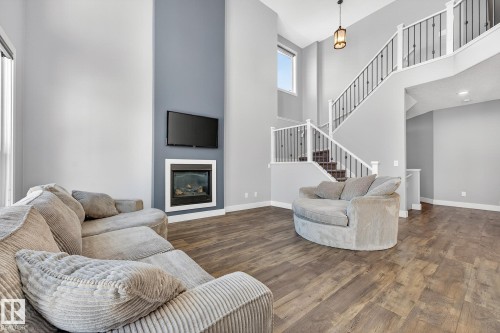 8810 24 Avenue, Edmonton, AB - Indoor Photo Showing Living Room With Fireplace
