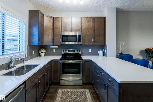 888 Cy Becker Drive, Edmonton, AB - Indoor Photo Showing Kitchen With Double Sink