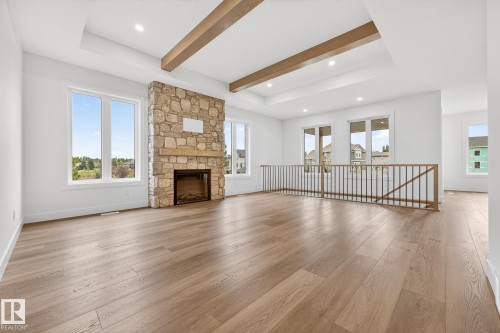 3912 40 Street, Beaumont, AB - Indoor Photo Showing Living Room With Fireplace