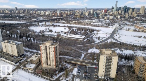Snowy aerial view with a view of city - 402 10649 Saskatchewan Drive, Edmonton, AB - Outdoor With View