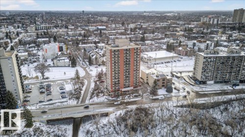 Snowy aerial view featuring a view of city - 402 10649 Saskatchewan Drive, Edmonton, AB - Outdoor With View