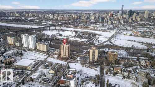 Snowy aerial view featuring a view of city - 402 10649 Saskatchewan Drive, Edmonton, AB - Outdoor With View