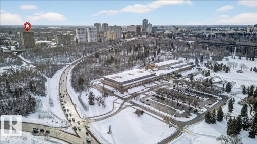 Snowy aerial view featuring a view of city - 402 10649 Saskatchewan Drive, Edmonton, AB - Outdoor With View