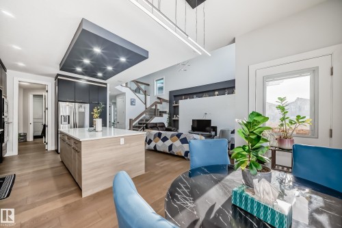 Dining space with light wood-style floors and recessed lighting - 17112 68 Street, Edmonton, AB - Indoor
