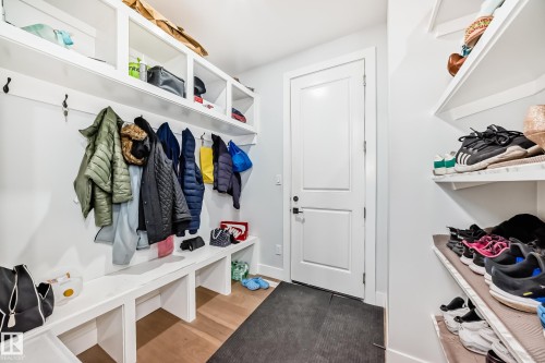 Mudroom with dark wood finished floors - 17112 68 Street, Edmonton, AB - Indoor With Storage
