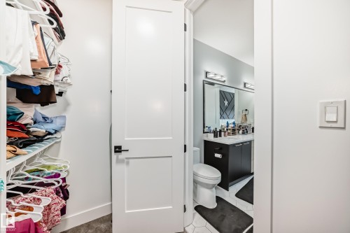 Bathroom featuring vanity and toilet - 17112 68 Street, Edmonton, AB - Indoor
