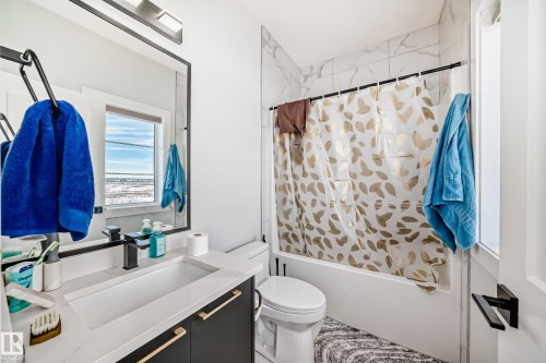 Full bath with shower / tub combo and vanity - 17112 68 Street, Edmonton, AB - Indoor Photo Showing Bathroom