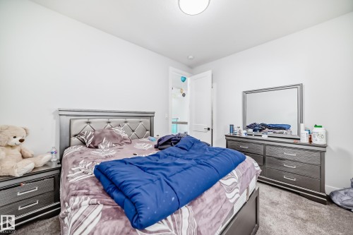 View of carpeted bedroom - 17112 68 Street, Edmonton, AB - Indoor Photo Showing Bedroom