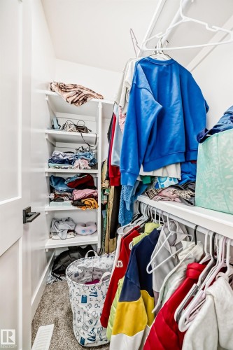 View of walk in closet - 17112 68 Street, Edmonton, AB - Indoor With Storage